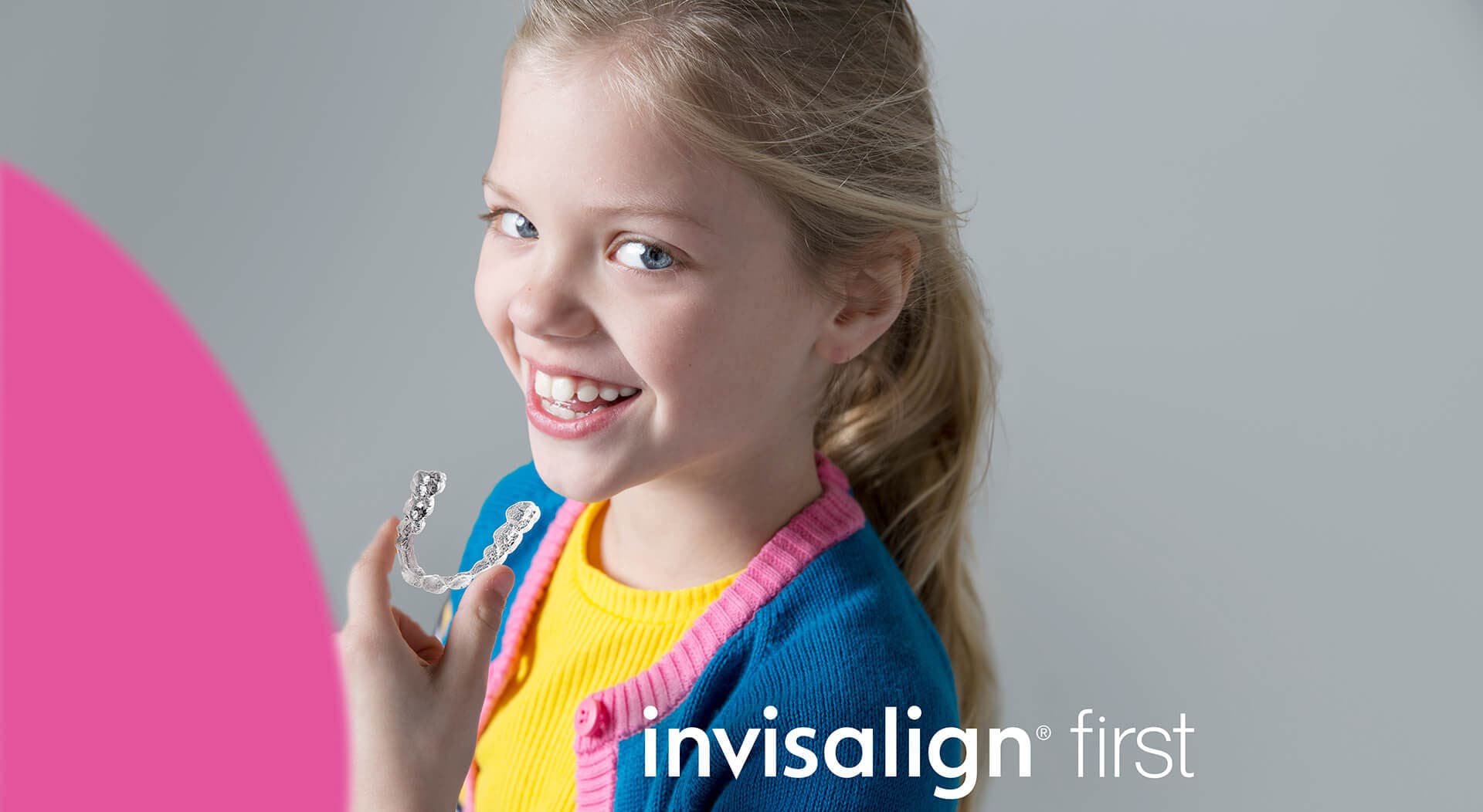 Young Invisalign First patient smiling